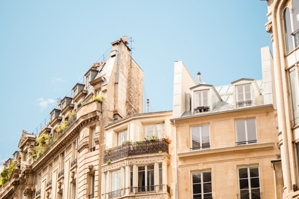 beige concrete building under blue sky during daytime
